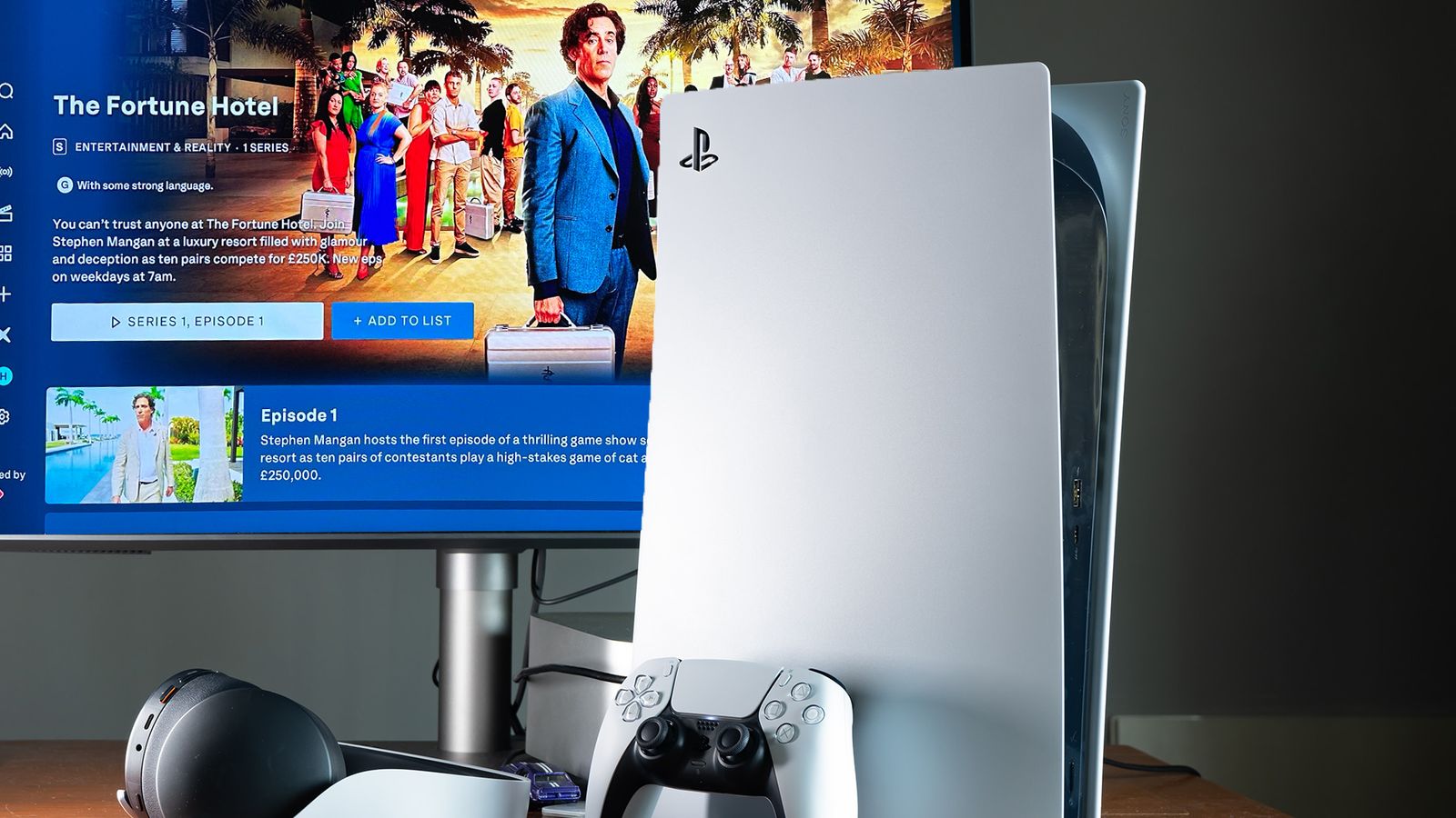 Playstation in front of a TV showing 'The Fortune Hotel' screen on ITVX - PR image