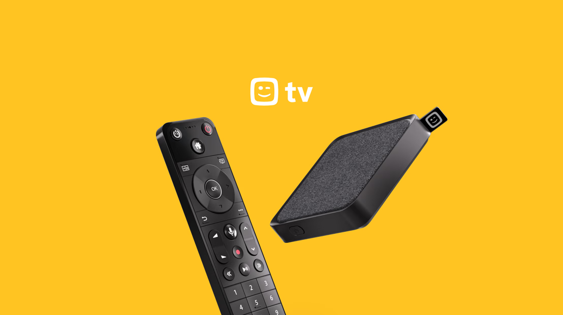 Telenet TV box IP with remote on a yellow background